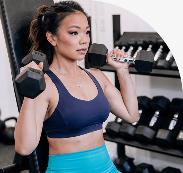 Female Racking Weights The Beginner's Guide to Lifting Weights for Women | Sohee Fit